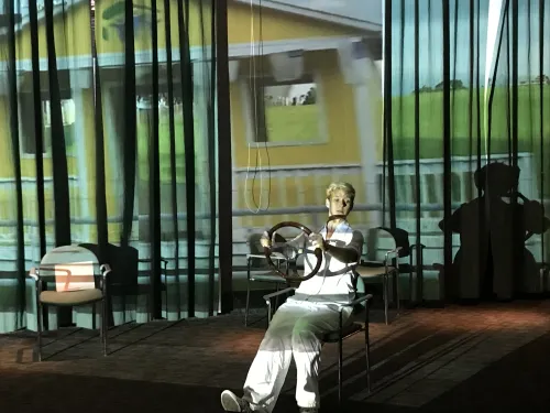 Becky in front of projection