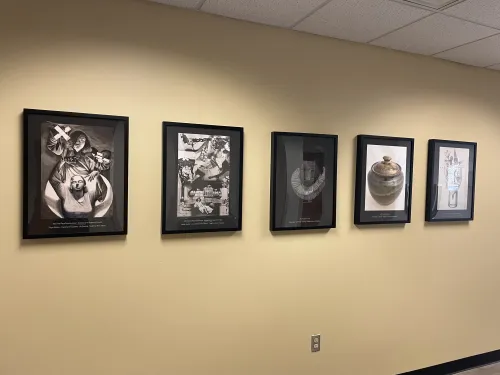 5 framed photos of student artwork