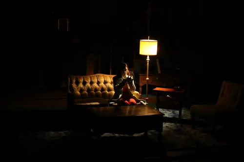 gild holding a goldfish bowl